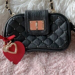 BEBE  BLACK ARM BAG WITH GOLD & LEATHER REMOVABLE STRAP & RED HEART PURSE DECORE